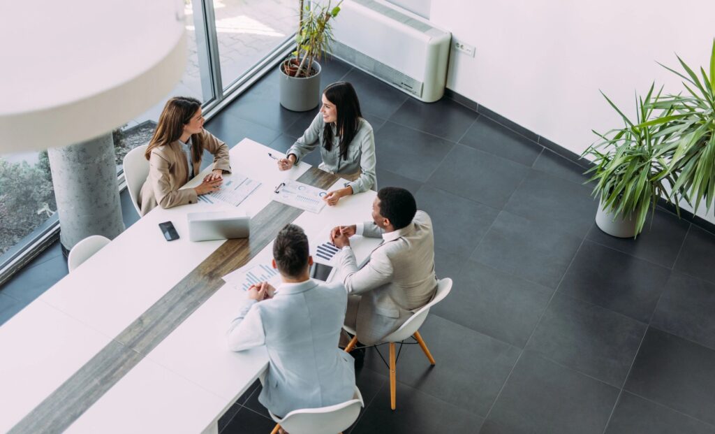 Business persons on meeting in the office.