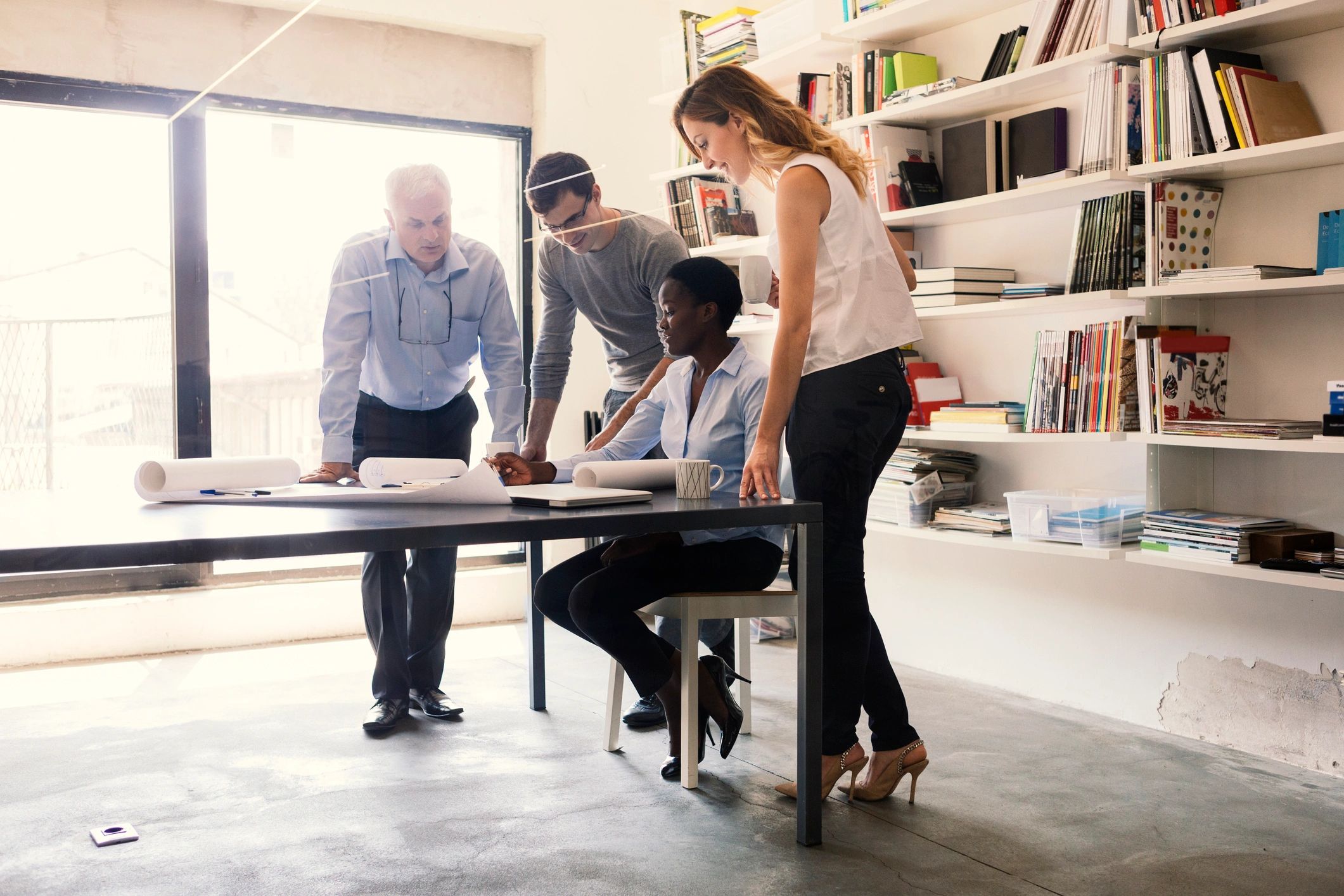 Business team meeting to review qualification requirements